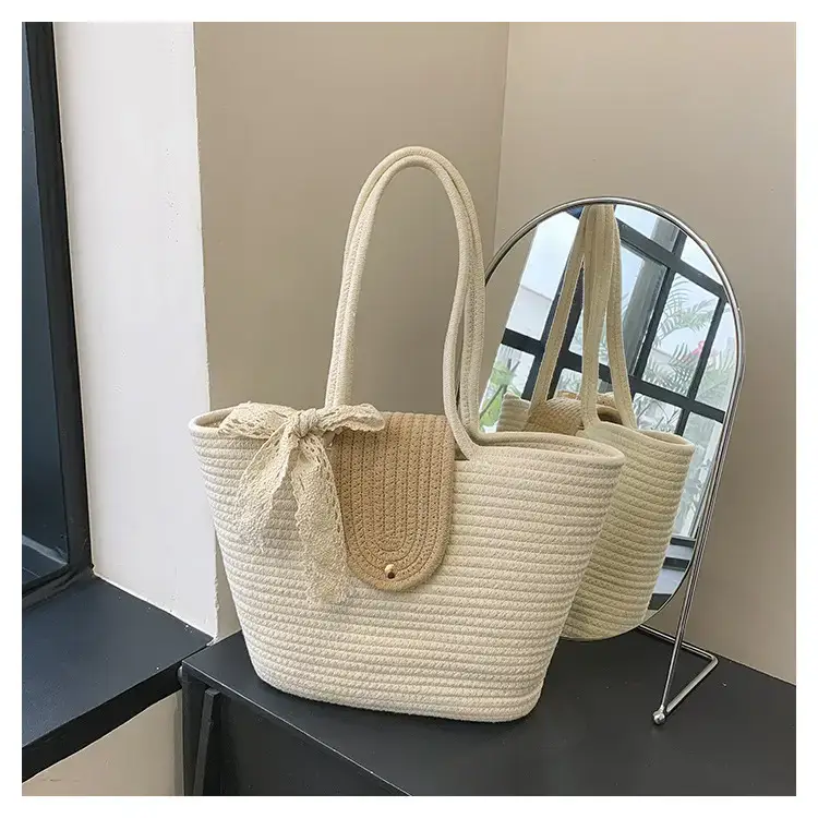 Women's woven straw tote bag with purple accent — feature 22