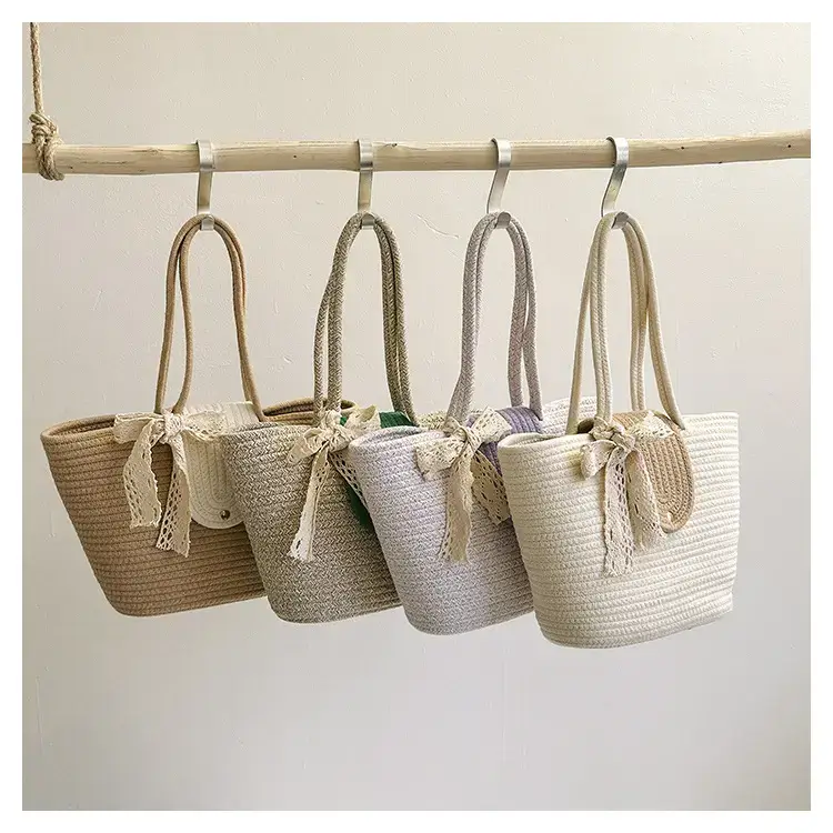 Women's woven straw tote bag with purple accent — feature 24