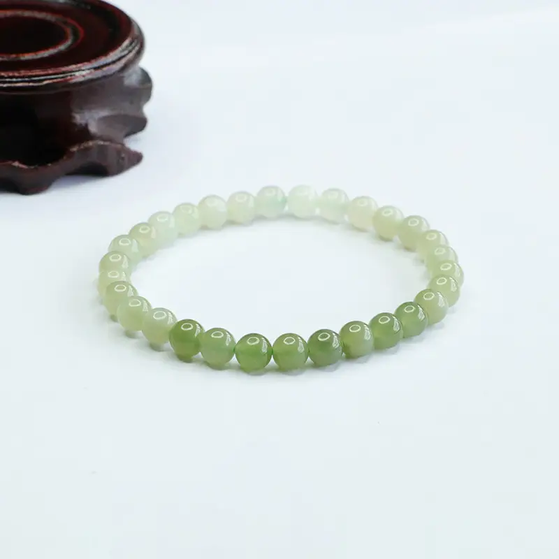 Aiyu Natural Jade Bracelet with Red Bead Gradient Design — feature 1