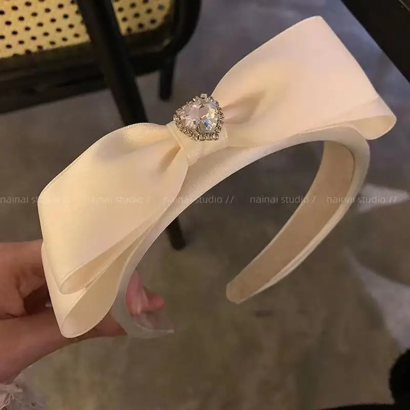 Black Satin Bow Headband with Zircon Heart Design - Image 3