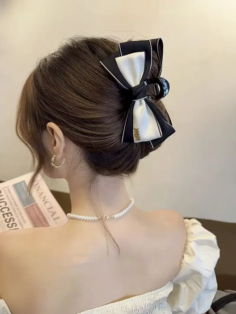 Oversized Black Silk Hair Clip with Pearl Accent — feature 21