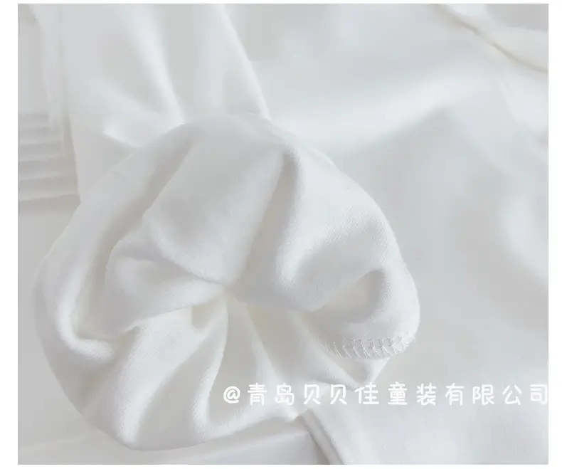 White Baby T-Shirts with Cute Embellishments — feature 23