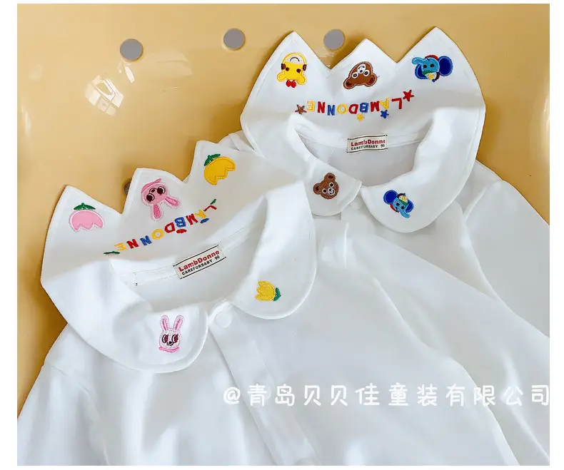 White Baby T-Shirts with Cute Embellishments — feature 26