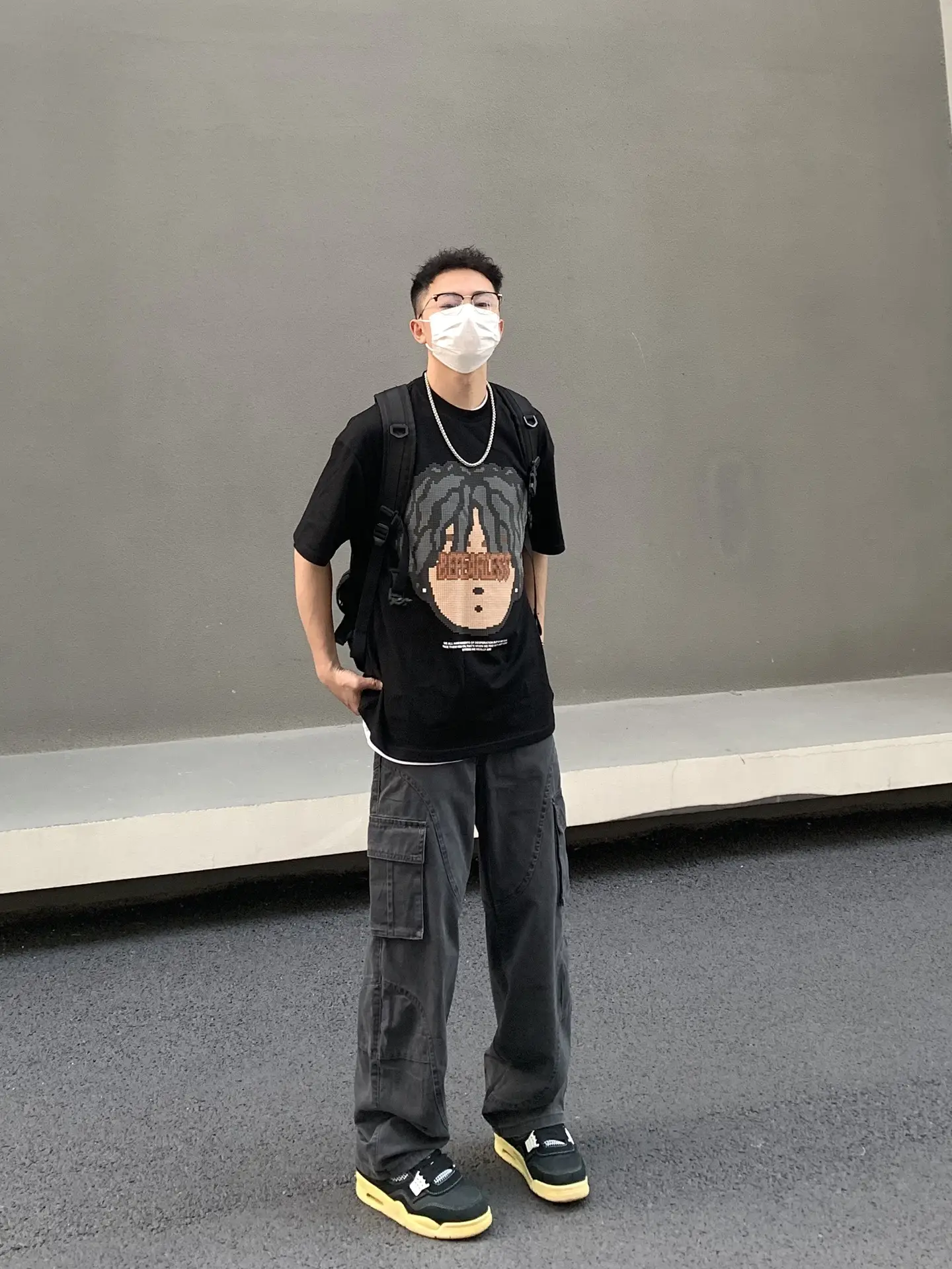 Men's Green Cargo Pants with Vintage Graphic T-Shirt