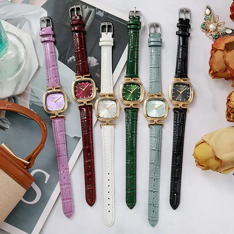 Women's Gold Plated Butterfly Watch with Pearl Strap
