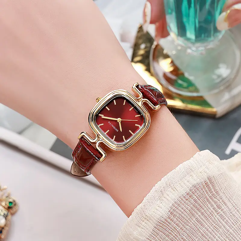 Women's Gold Plated Butterfly Watch with Pearl Strap — feature 3