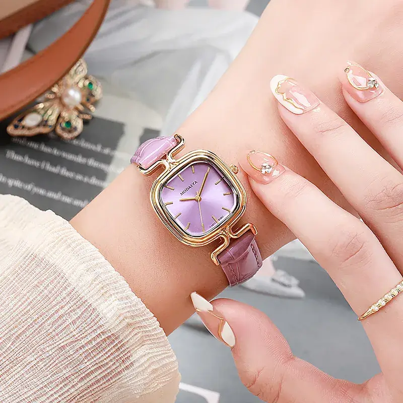 Women's Gold Plated Butterfly Watch with Pearl Strap