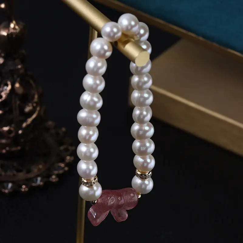 French Retro Pearl Bracelet with Butterfly Charm - Image 2