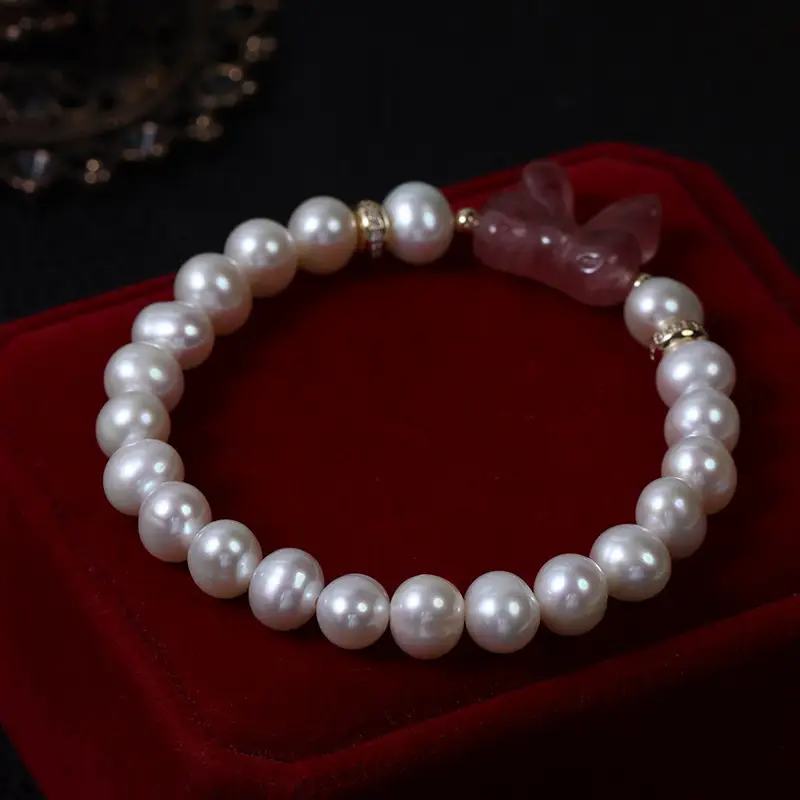 French Retro Pearl Bracelet with Butterfly Charm - Image 3