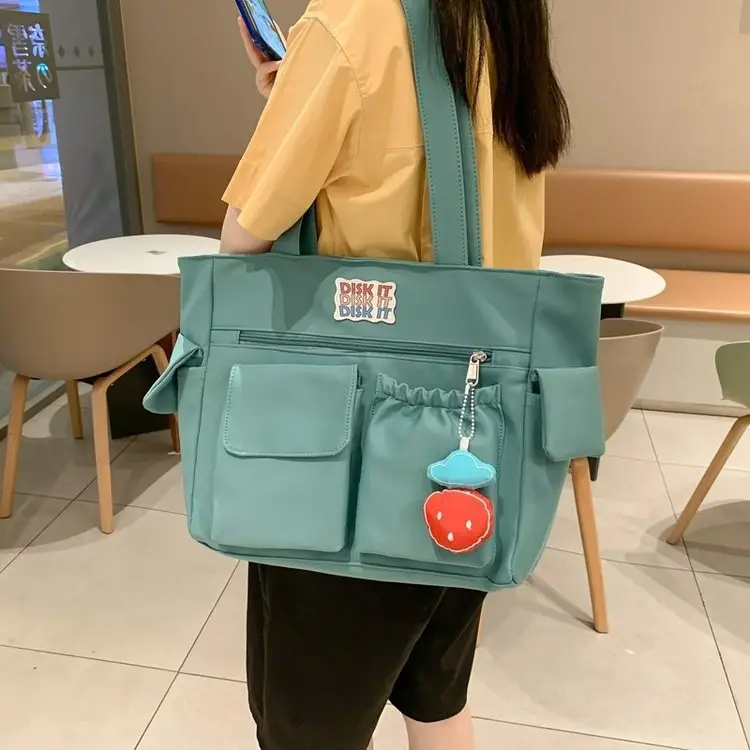 Women's Light Blue Shoulder Bag with Keychain - Image 6