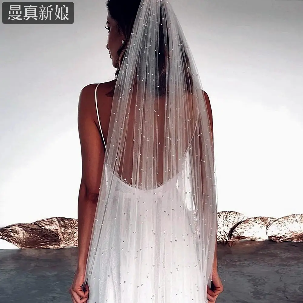 White Beaded Bridal Veil with Hair Accessory — feature 7