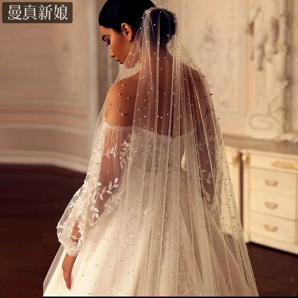 White Beaded Bridal Veil with Hair Accessory — feature 9