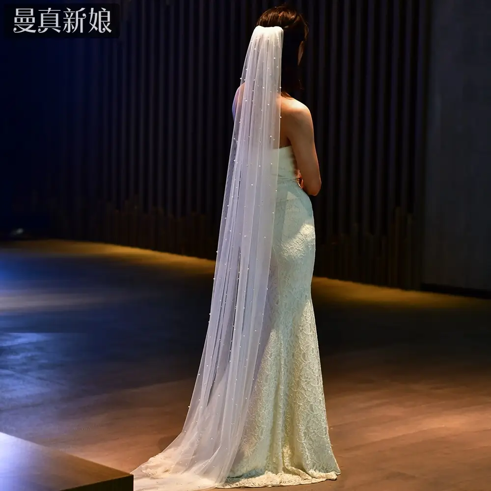 White Beaded Bridal Veil with Hair Accessory - Image 11