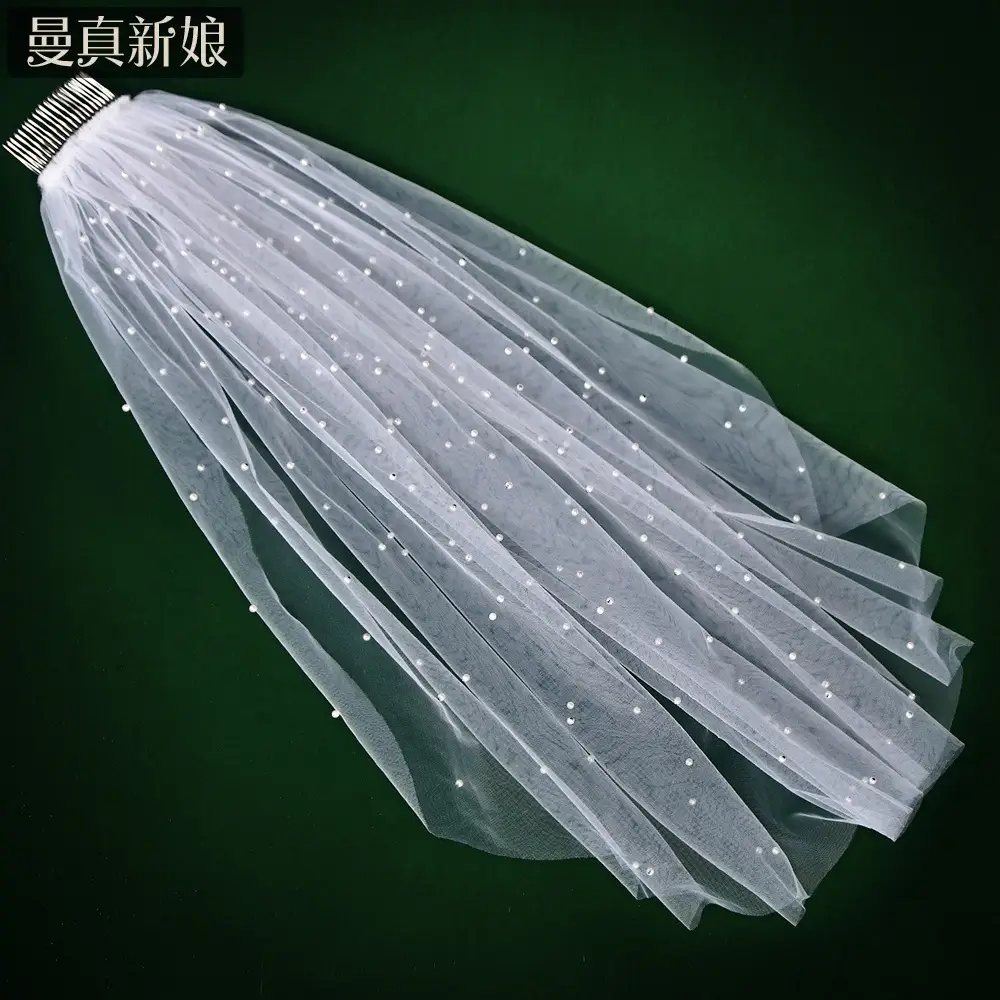 White Beaded Bridal Veil with Hair Accessory - Image 2