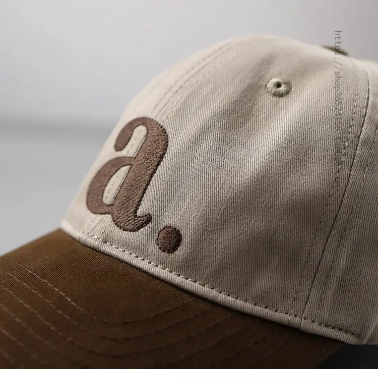 Peaked Cap with Red 'a' Embroidery White Red