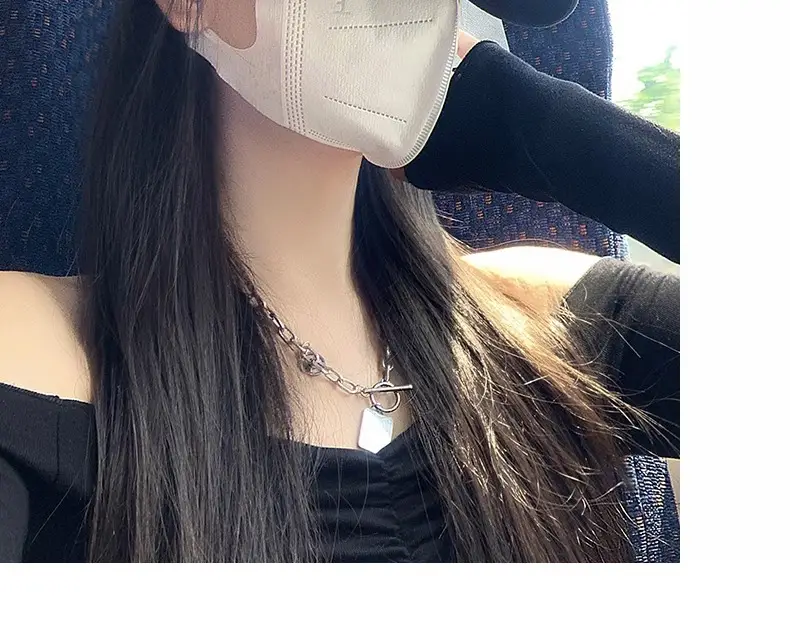 Beige Embroidered Baseball Cap with Face Design — feature 17