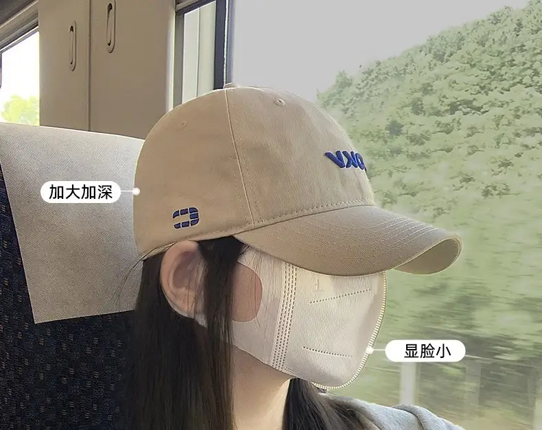 Beige Embroidered Baseball Cap with Face Design — feature 2