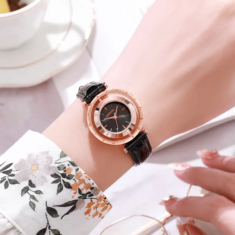 Elegant Women's Watch with Brown Leather Strap & Gold Dial — feature 1