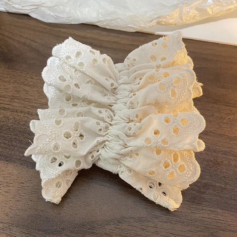 French Lace Hair Ring Beige Black Embroidered Cut Out — feature 1