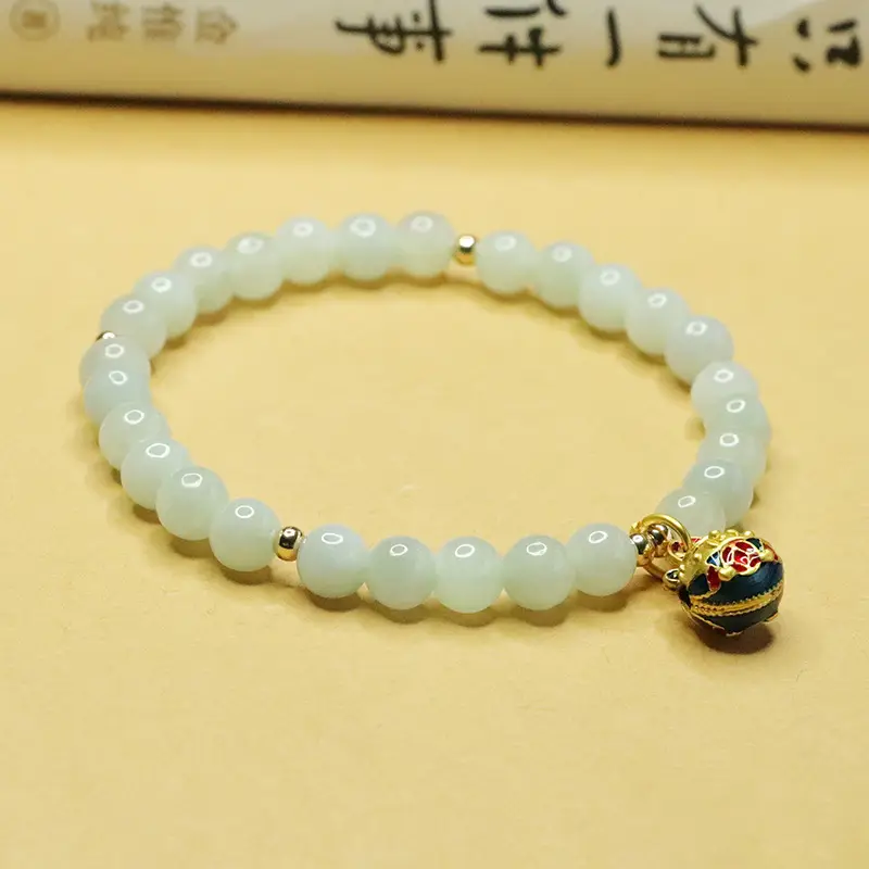 Jadeite Bracelet with Gold Beads and Pearl Drop
