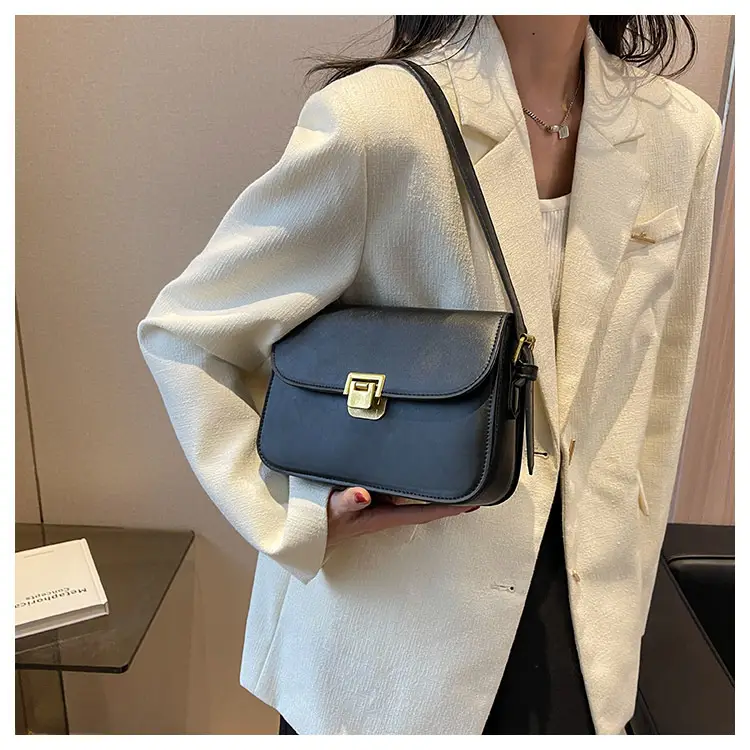 Women's Brown Leather Shoulder Bag with Gold Clasp — feature 17