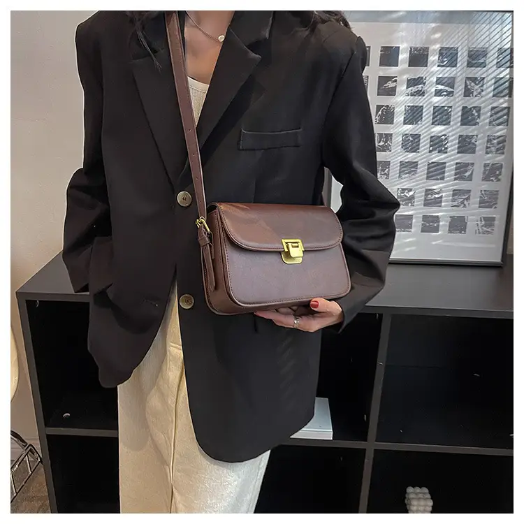 Women's Brown Leather Shoulder Bag with Gold Clasp — feature 22