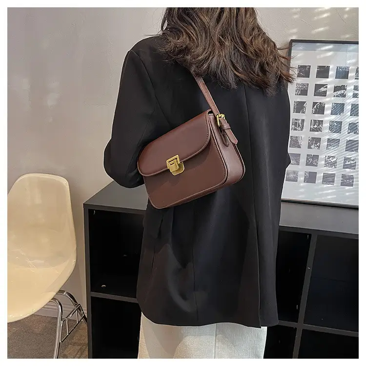 Women's Brown Leather Shoulder Bag with Gold Clasp — feature 24