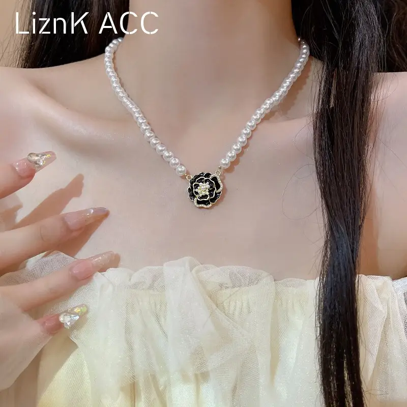 Black & White Camellia Pearl Necklace Women's High-end Light Luxury Niche Design Woolen Chain Beaded Elegant Clavicle Chain - Image 4