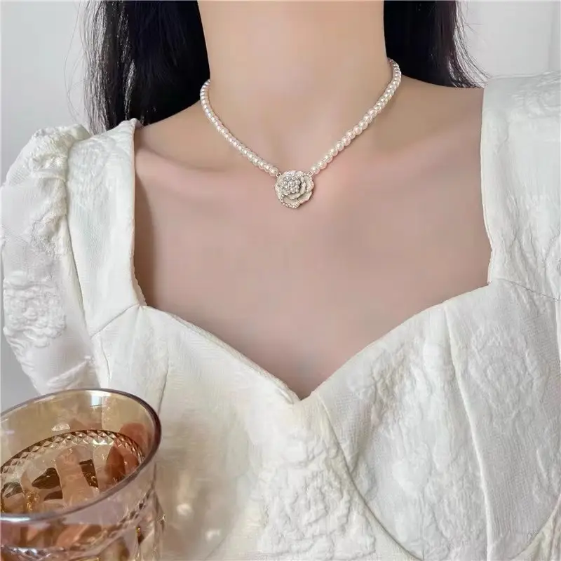 Black & White Camellia Pearl Necklace Women's High-end Light Luxury Niche Design Woolen Chain Beaded Elegant Clavicle Chain - Image 5