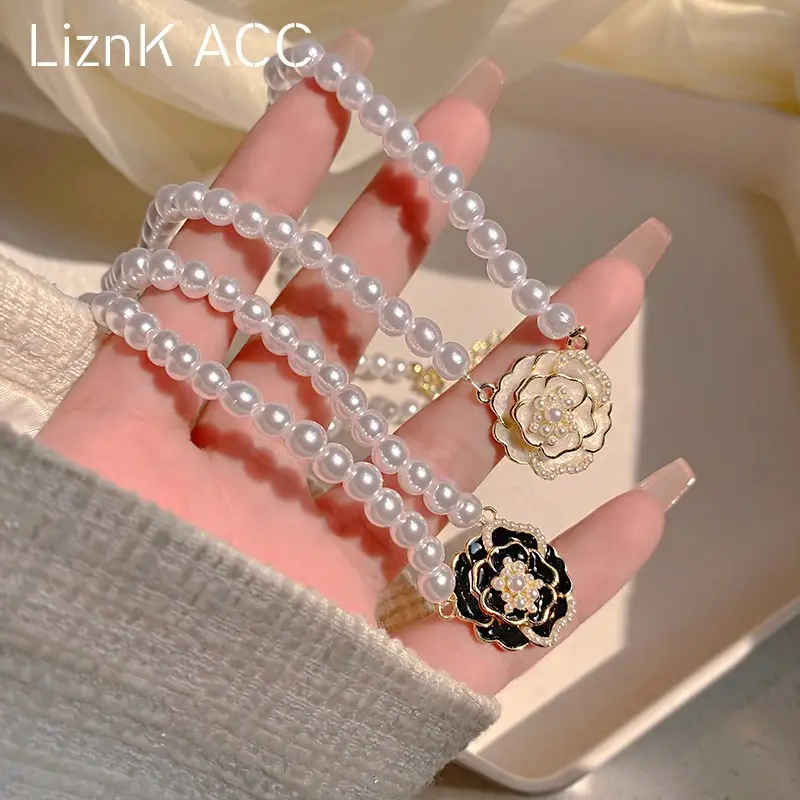 Black & White Camellia Pearl Necklace Women's High-end Light Luxury Niche Design Woolen Chain Beaded Elegant Clavicle Chain - Image 6