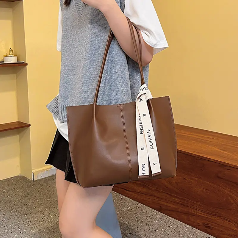 Women's Brown Leather Shoulder Bag with Brand Tag - Image 4