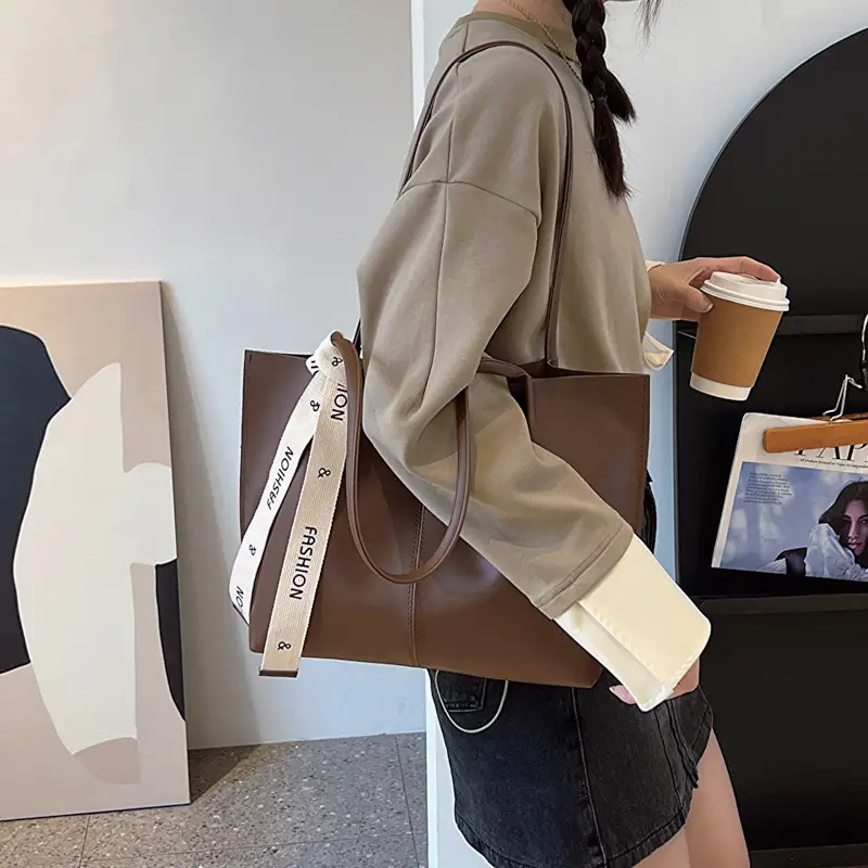 Women's Brown Leather Shoulder Bag with Brand Tag - Image 6