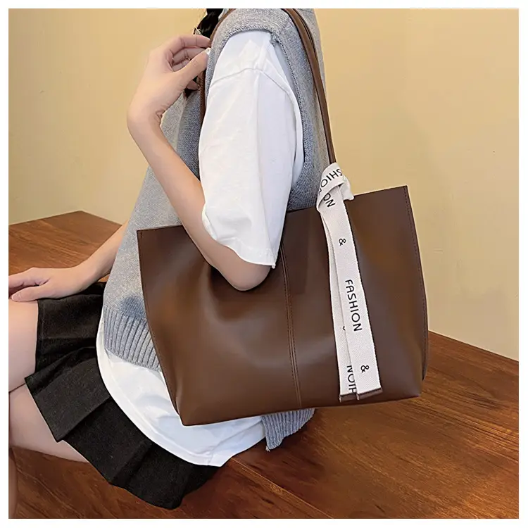 Women's Brown Leather Shoulder Bag with Brand Tag — feature 10