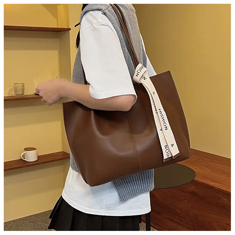Women's Brown Leather Shoulder Bag with Brand Tag — feature 11