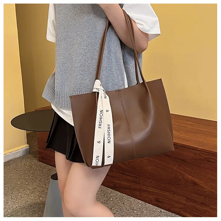Women's Brown Leather Shoulder Bag with Brand Tag — feature 12