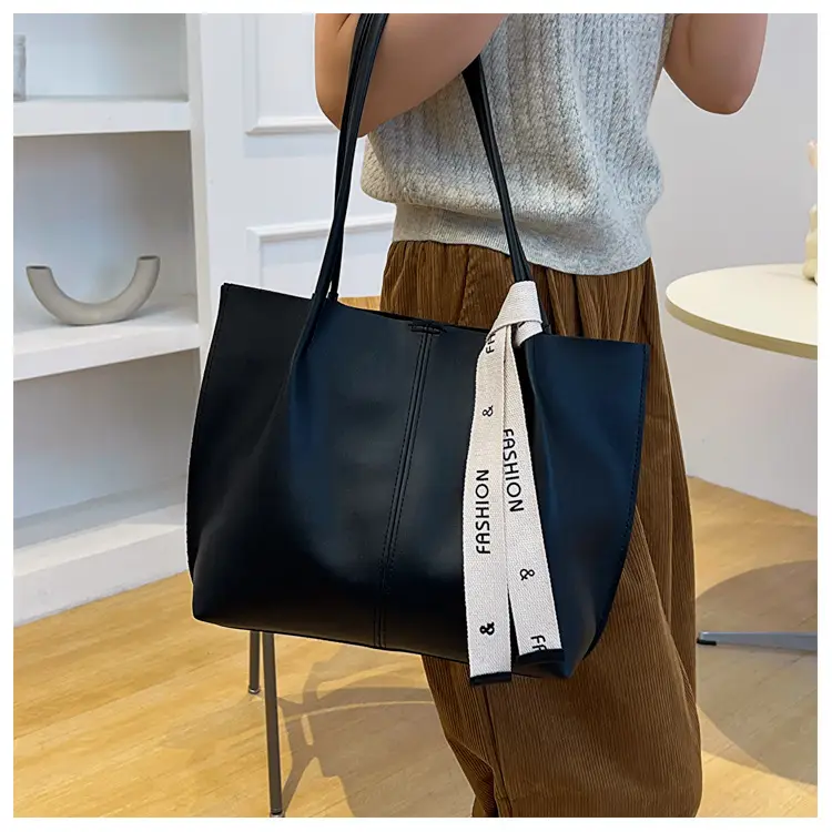 Women's Brown Leather Shoulder Bag with Brand Tag — feature 16