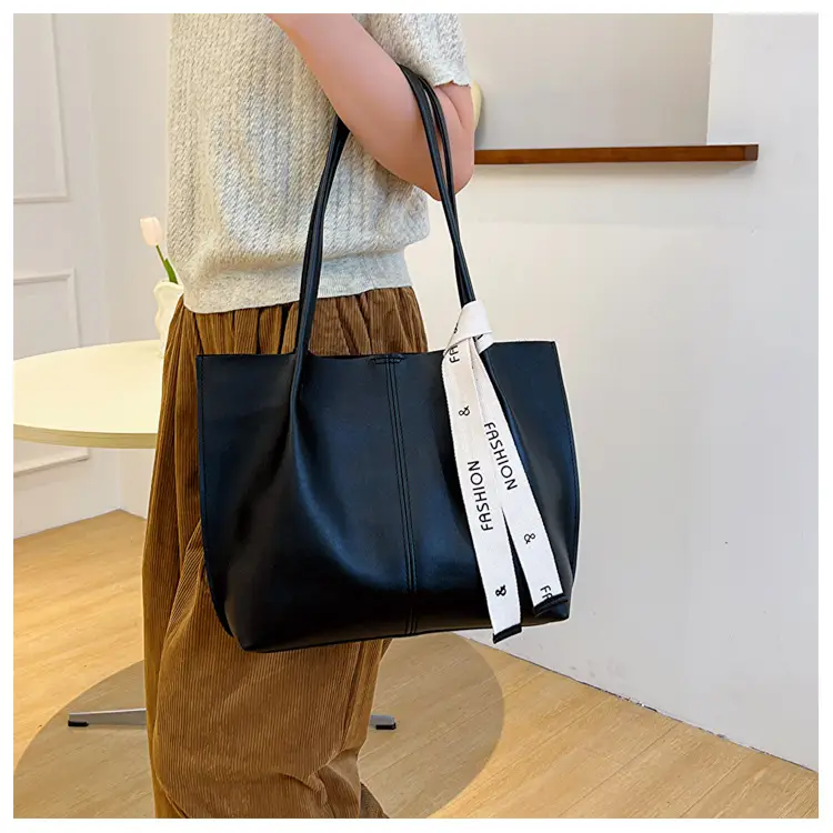 Women's Brown Leather Shoulder Bag with Brand Tag — feature 18
