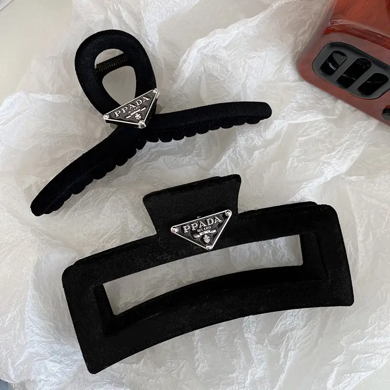 Black Triangular Logo Hair Clip Retro French Shark 2023 — feature 32