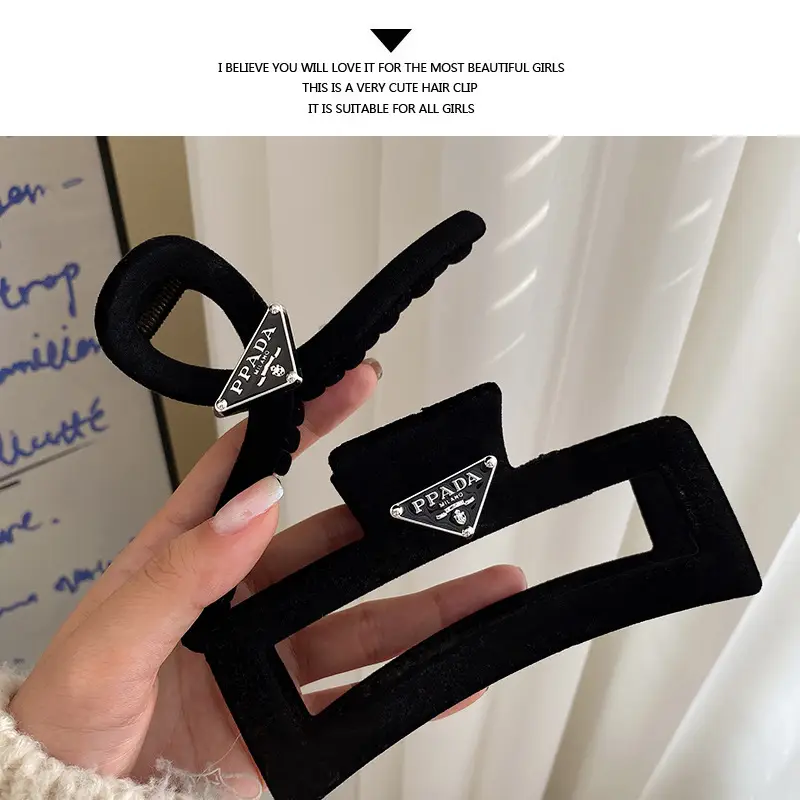 Black Triangular Logo Hair Clip Retro French Shark 2023 — feature 33