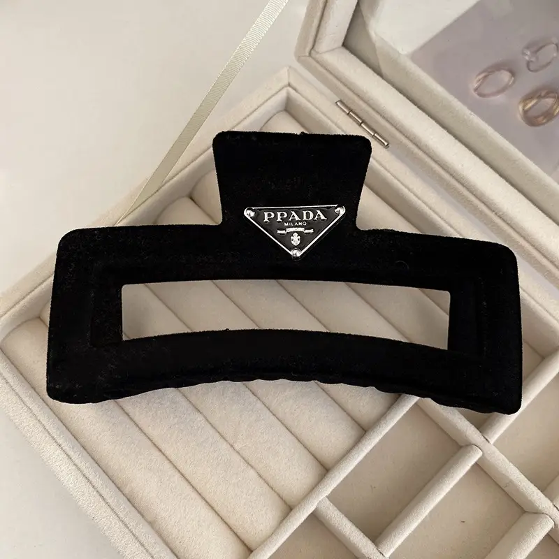 Black Triangular Logo Hair Clip Retro French Shark 2023 - Image 2