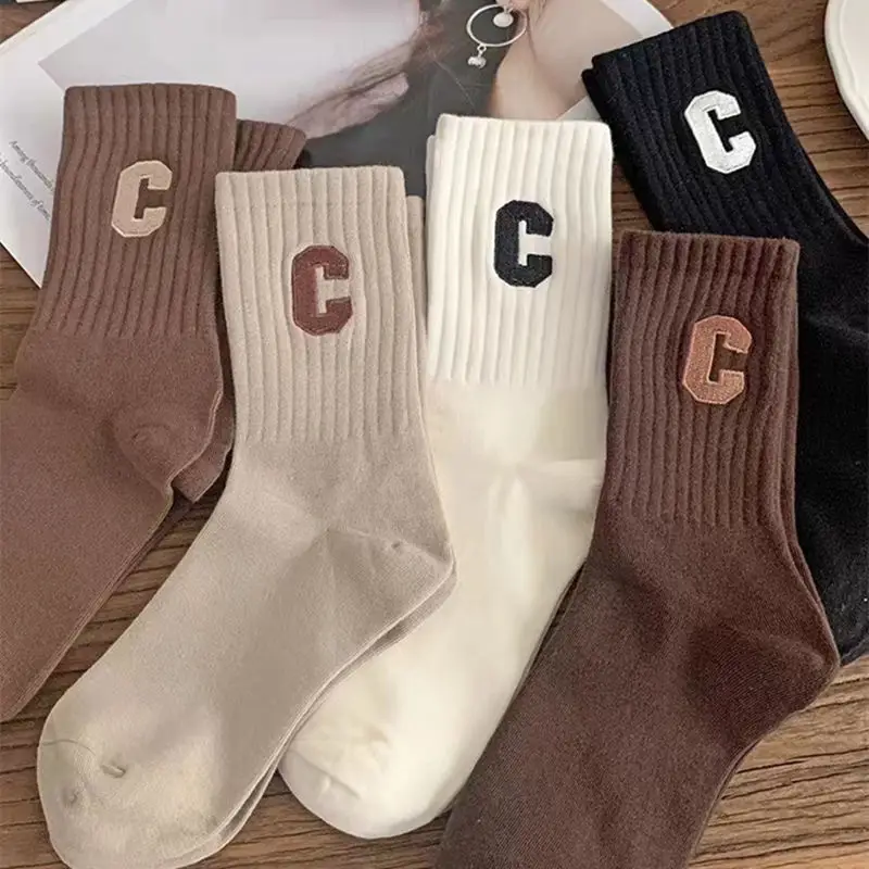 sp socks men's mid-calf socks trendy versatile autumn and winter warm Men's stockings letters sports trendy socks breathable manufacturers