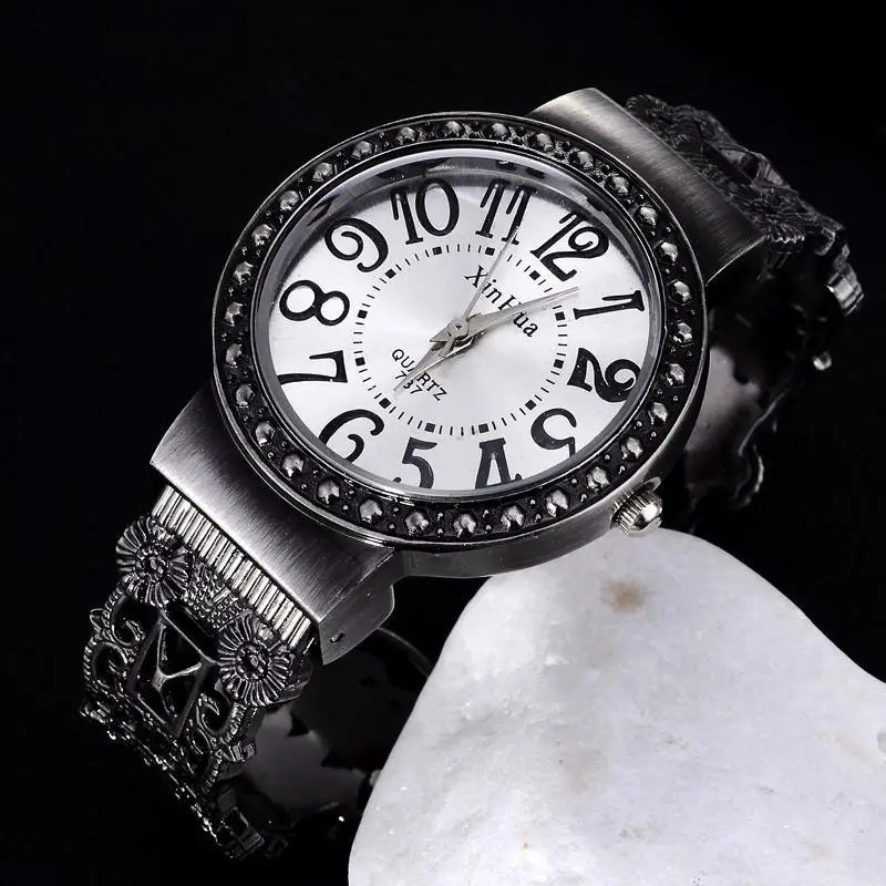 Women's Black Crystal Bracelet Watch with Diamond Dial — feature 1