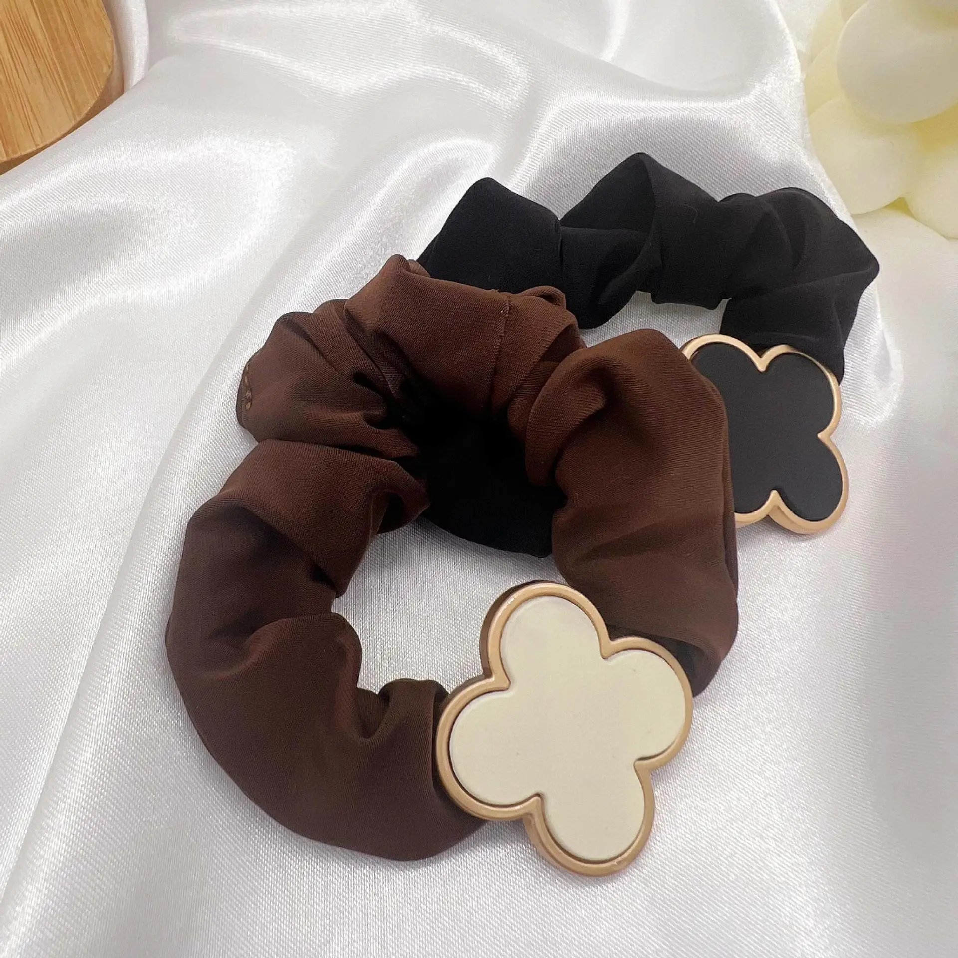 Black Retro French Hair Band with Gold Clover Design — feature 2