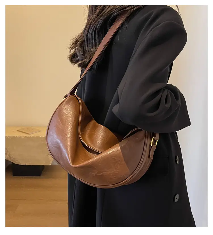 Women's Curved Leather Shoulder Bag Tan Autumn Winter 2023 — feature 1