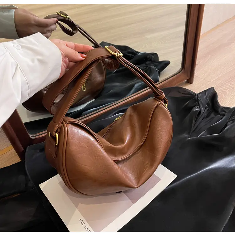 Women's Curved Leather Shoulder Bag Tan Autumn Winter 2023 — feature 21