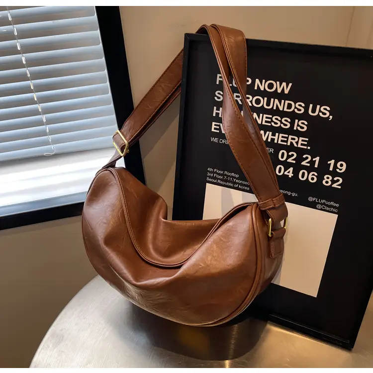 Women's Curved Leather Shoulder Bag Tan Autumn Winter 2023 — feature 31