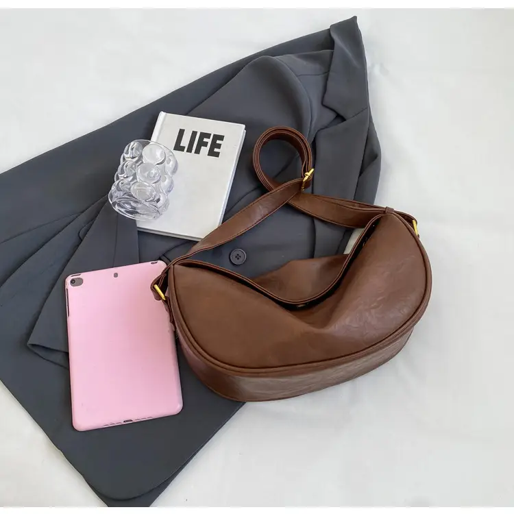 Women's Curved Leather Shoulder Bag Tan Autumn Winter 2023 — feature 40
