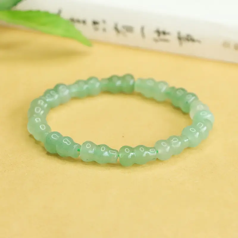 Green Jade Gourd Bracelet with "K" Engraving - Image 3