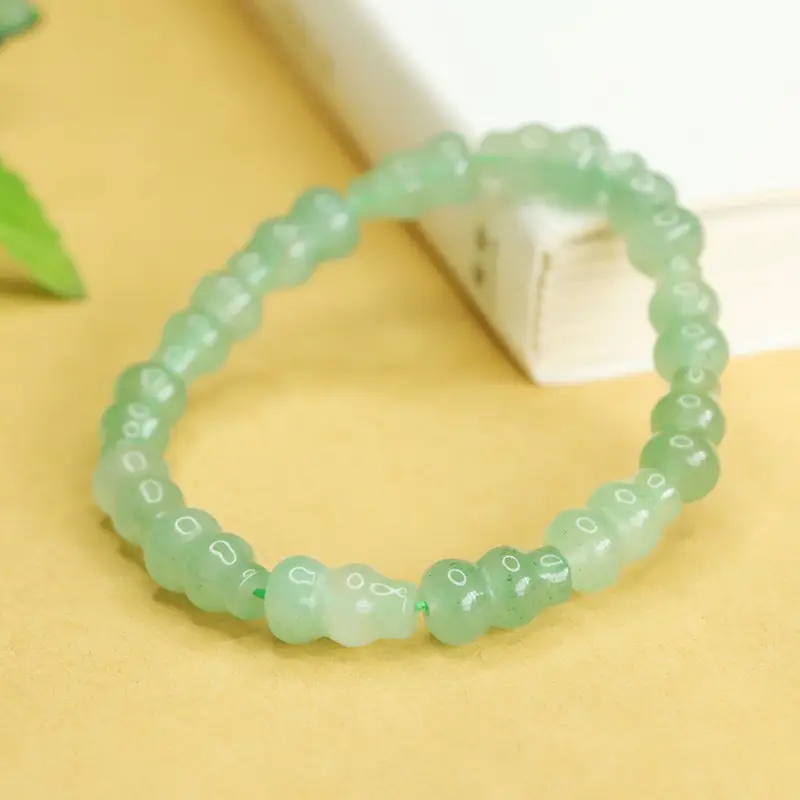 Green Jade Gourd Bracelet with "K" Engraving - Image 4