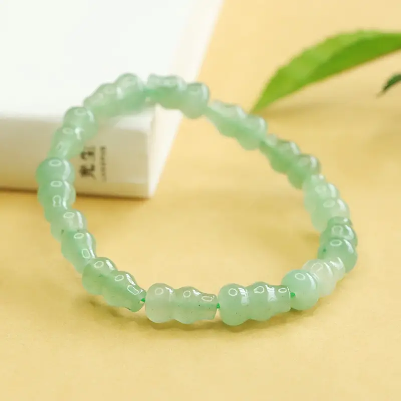 Green Jade Gourd Bracelet with "K" Engraving - Image 5